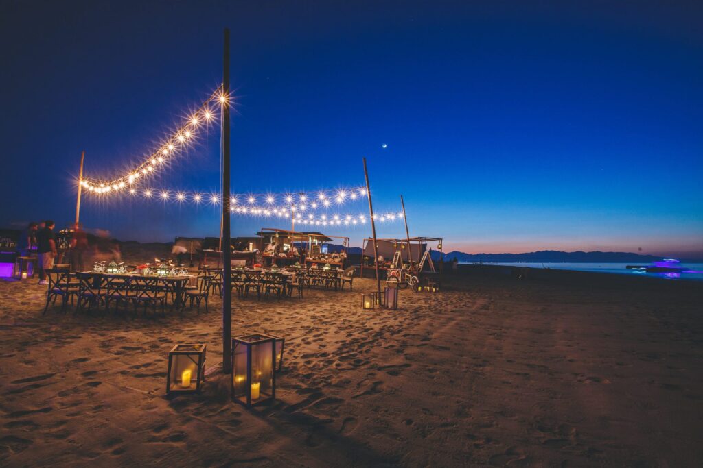Dining on the beach at Costa Palmas includes great lighting and fresh local fair