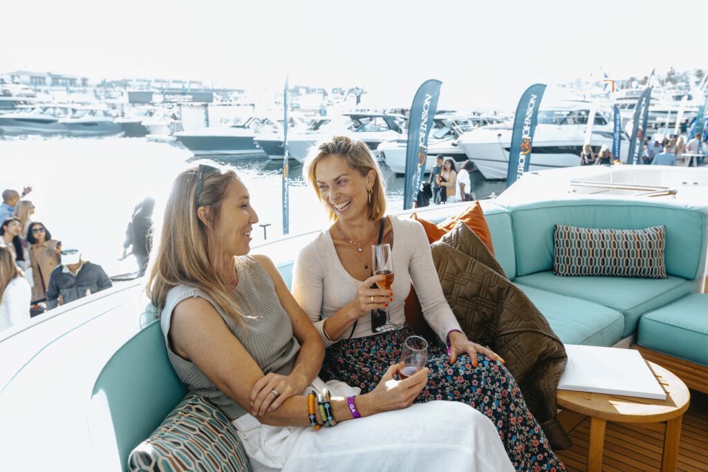Friends enjoy a chat on-deck. Good yacht etiquette makes for comfortable and easy sailing